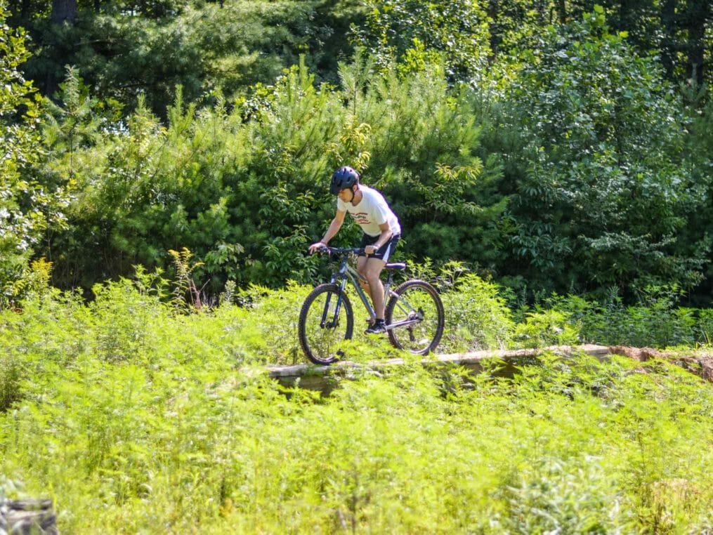 Boy biking on a trail