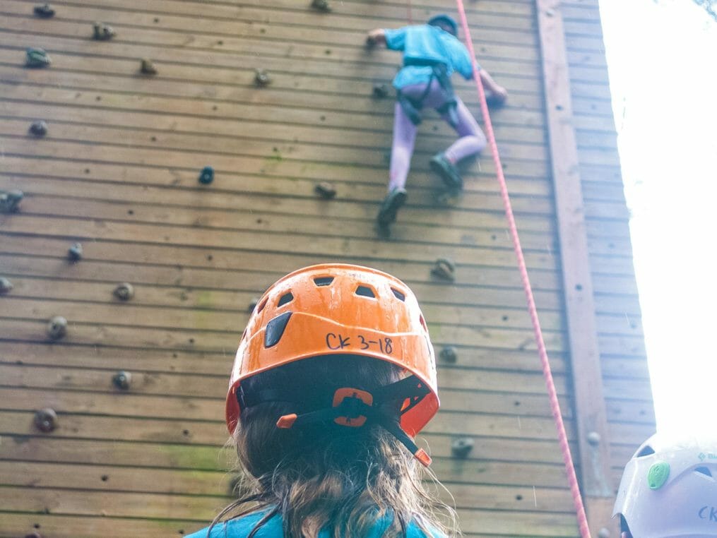 Camper belaying at the Hendersonville Adventure Day Camp