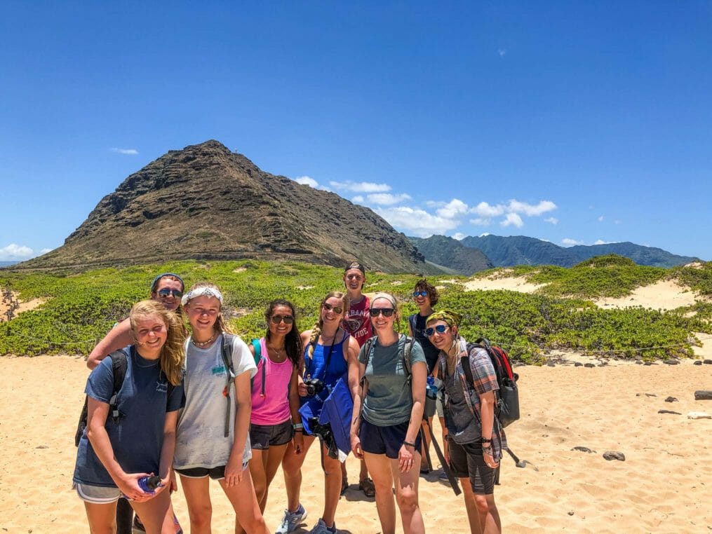 Campers hiking on a sunny day on the Hawaii Expedition trip