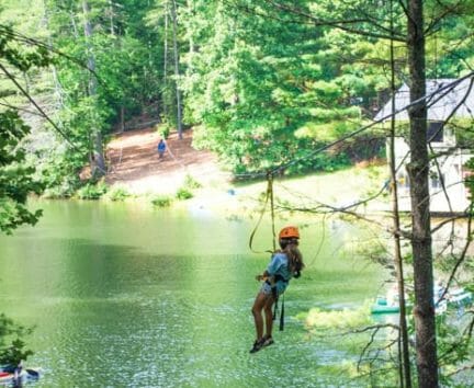 Camper zip lining at the Hendersonville Adventure Day Camp